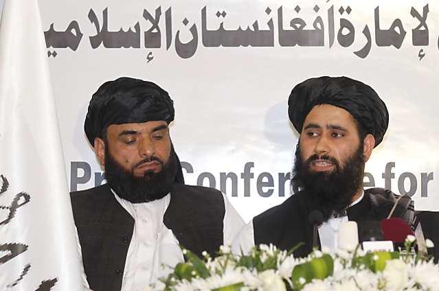 Muhammad Naeem, a spokesman for the Office of the Taliban of Afghanistan speaks during the opening of the Taliban Afghanistan Political Office in Doha