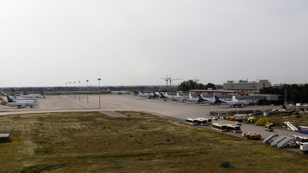 Airplanes are seen at the airport in Tripoli