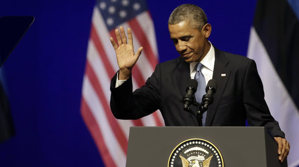 U.S. President Barack Obama greets the audience before his remarks in Tallinn